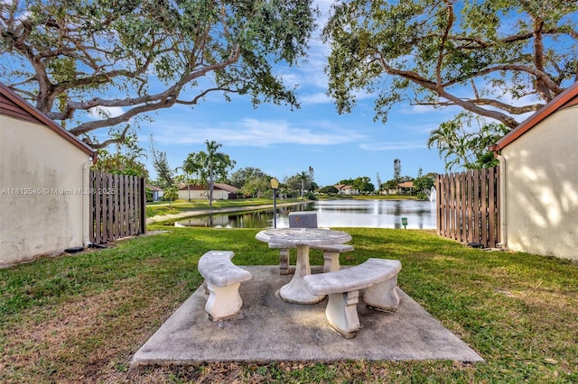 4864 Sable Pine Cir Unit A, West Palm Beach, FL 33417 - view of yard featuring a water view and a patio