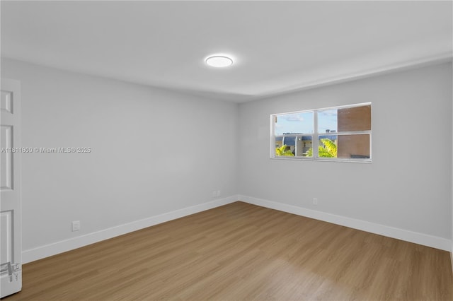7900 S Colony Cir Unit 206, Tamarac, FL 33321 - empty room with baseboards and wood finished floors