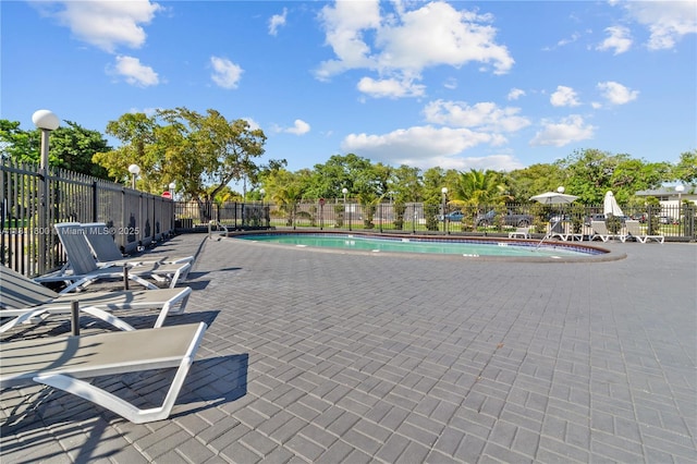 7900 S Colony Cir Unit 206, Tamarac, FL 33321 - community pool featuring a patio