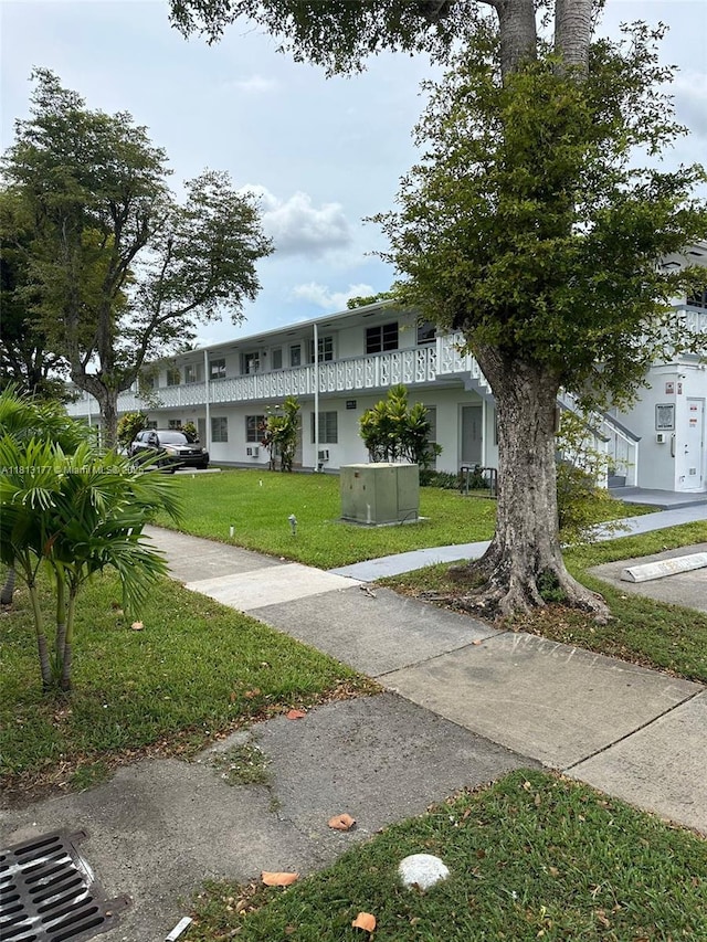 100 NW 204th St Unit 3, Miami Gardens, FL 33169 - view of front of property featuring a front yard