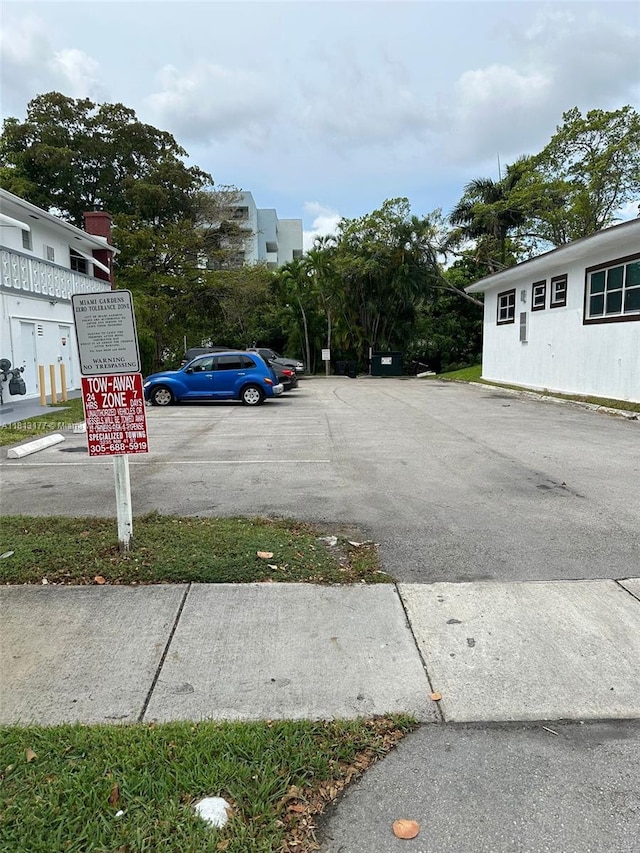 100 NW 204th St Unit 3, Miami Gardens, FL 33169 - view of uncovered parking lot
