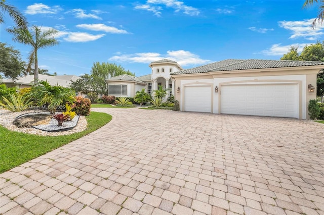 3250 W Stonebrook Cir, Davie, FL 33330 - mediterranean / spanish home with decorative driveway and stucco siding