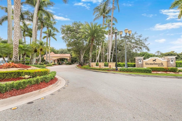 3250 W Stonebrook Cir, Davie, FL 33330 - view of asphalt street with curbs and street lights