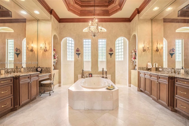 3250 W Stonebrook Cir, Davie, FL 33330 - full bath featuring a chandelier, a bath, two vanities, crown molding, and a tray ceiling