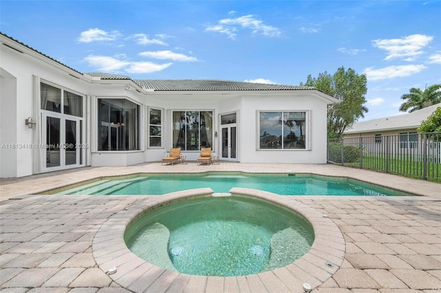 3250 W Stonebrook Cir, Davie, FL 33330 - view of swimming pool with a patio area and a pool with connected hot tub