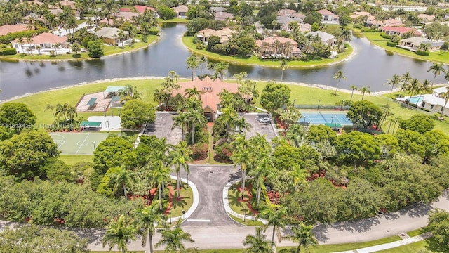 3250 W Stonebrook Cir, Davie, FL 33330 - aerial view of property and surrounding area with a nearby body of water and nearby suburban area