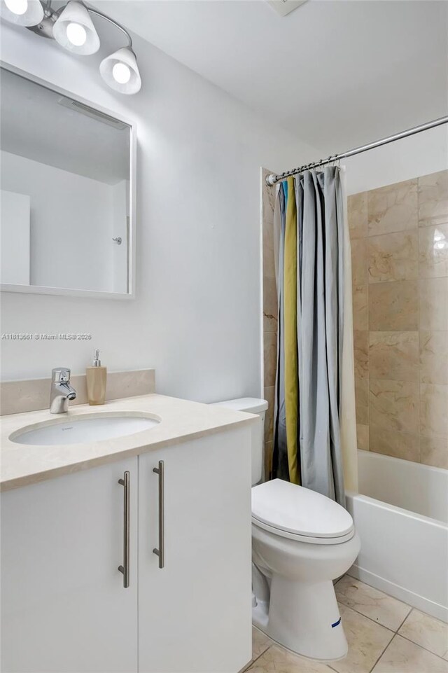 3330 NE 190th St Unit 416, Aventura, FL 33180 - full bathroom featuring toilet, vanity, and shower / bath combo with shower curtain