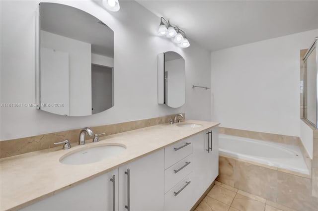 3330 NE 190th St Unit 416, Aventura, FL 33180 - bathroom with a bath, double vanity, and tile patterned floors