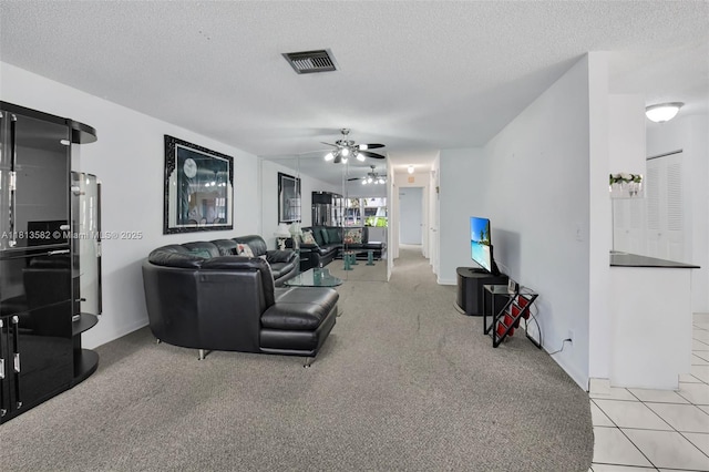 14386 Campanelli Dr, Delray Beach, FL 33484 - living room featuring a ceiling fan, a textured ceiling, and light carpet