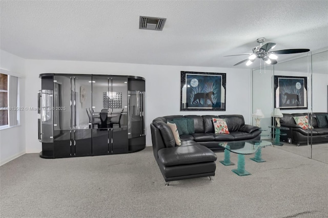 14386 Campanelli Dr, Delray Beach, FL 33484 - living area with a textured ceiling, carpet, and ceiling fan