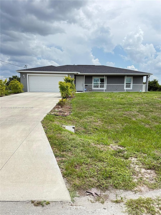 3031 Cherry Ln, La Belle, FL 33935 - single story home featuring concrete driveway, an attached garage, a front yard, stucco siding, and a porch