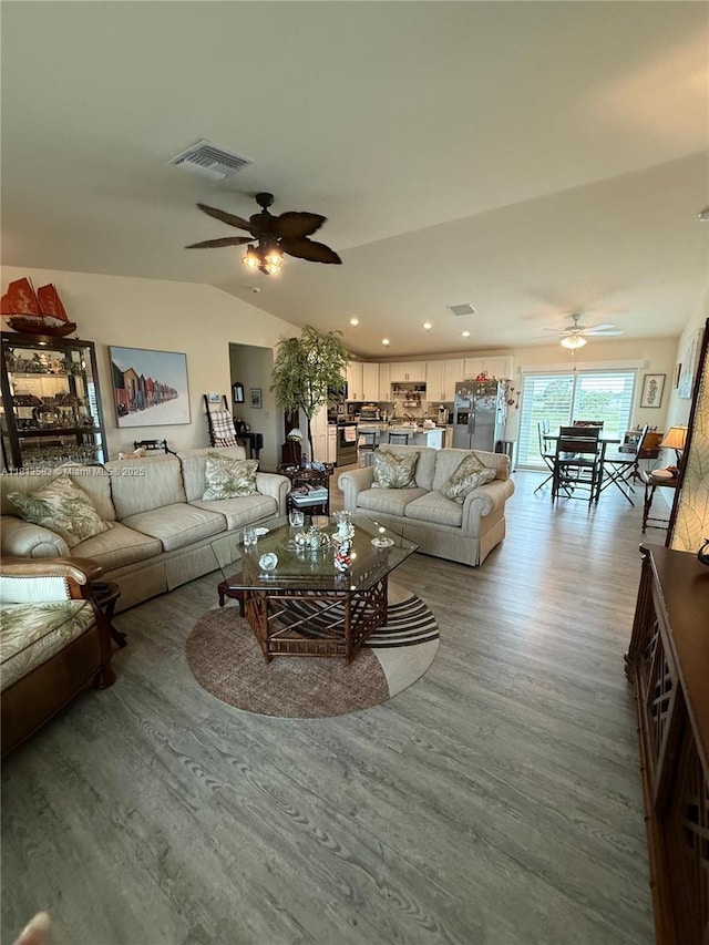 3031 Cherry Ln, La Belle, FL 33935 - living area with ceiling fan, light wood-style floors, vaulted ceiling, and recessed lighting