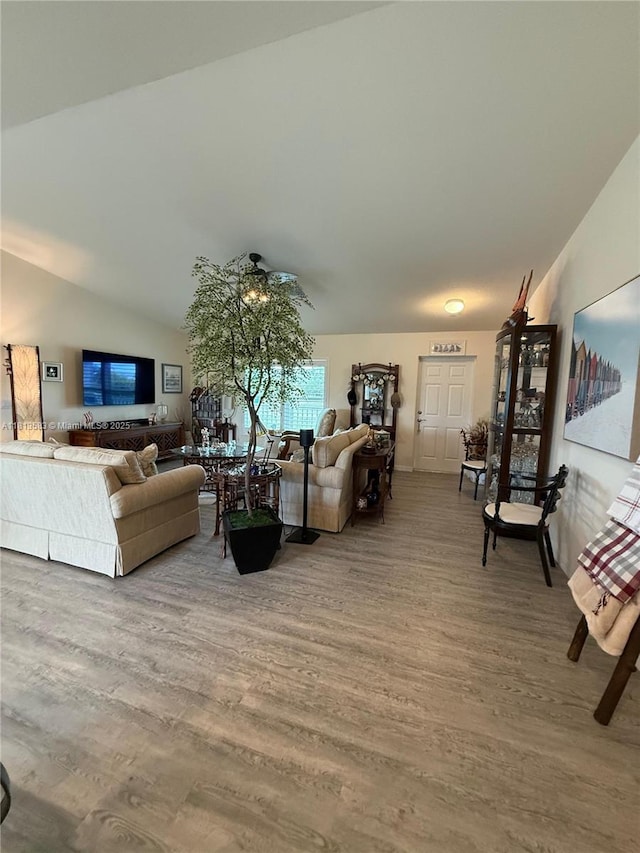 3031 Cherry Ln, La Belle, FL 33935 - living area with wood finished floors and lofted ceiling