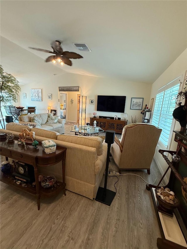 3031 Cherry Ln, La Belle, FL 33935 - living area with vaulted ceiling, wood finished floors, and ceiling fan