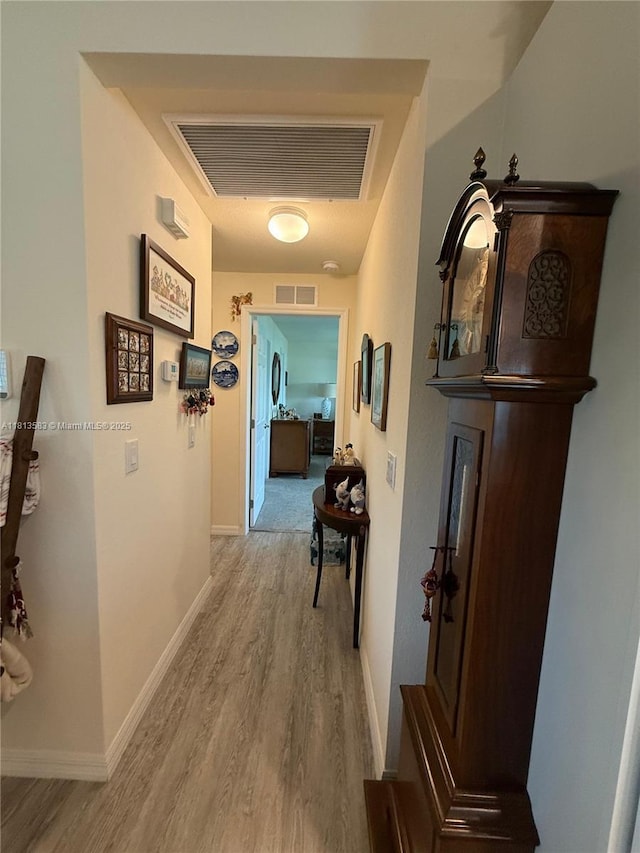 3031 Cherry Ln, La Belle, FL 33935 - hall with wood finished floors and baseboards