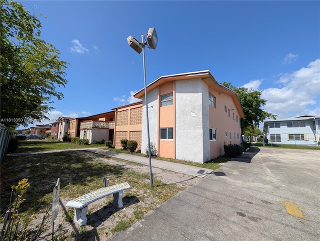 19080 NE 3rd Ct Unit 311, Miami, FL 33179 - view of building exterior with a residential view