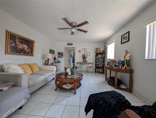 19080 NE 3rd Ct Unit 311, Miami, FL 33179 - living room featuring ceiling fan, a textured ceiling, and light tile patterned flooring
