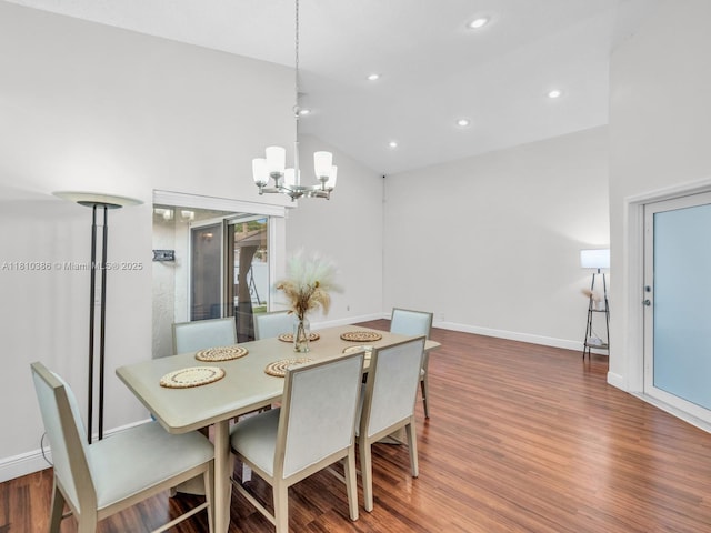 2810 River Run Cir E, Miramar, FL 33025 - dining space with wood finished floors, a chandelier, recessed lighting, baseboards, and high vaulted ceiling
