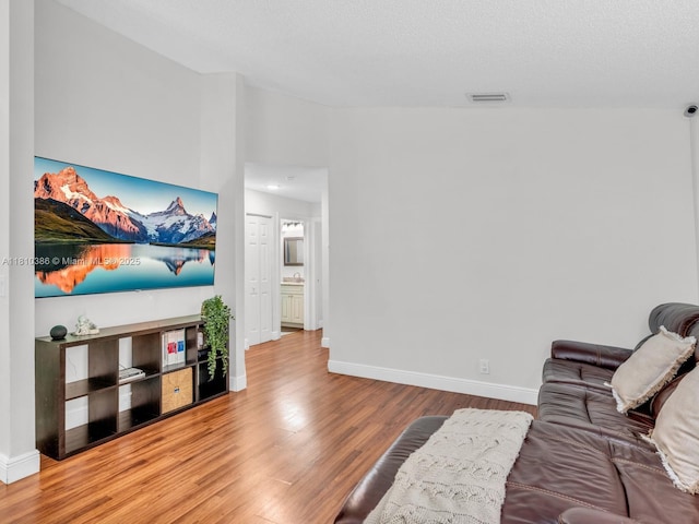 2810 River Run Cir E, Miramar, FL 33025 - living area with wood finished floors and baseboards