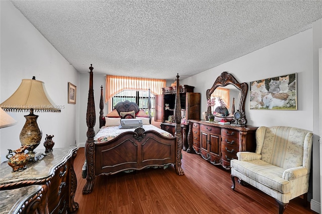 6195 Rock Island Rd Unit 215, Tamarac, FL 33319 - bedroom with a textured ceiling and dark wood-type flooring