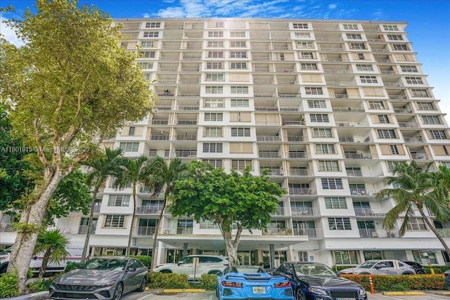 1865 79th St Unit 12G, North Bay Village, FL 33141 - view of apartment building / complex featuring uncovered parking