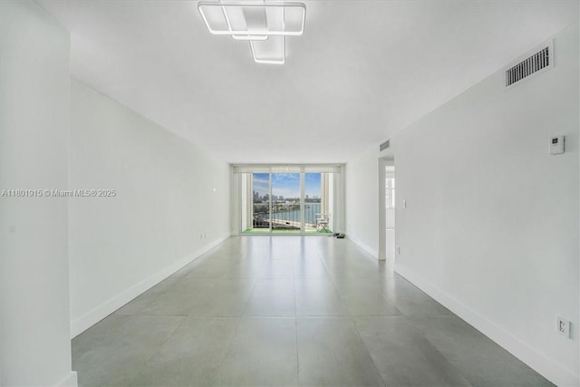 1865 79th St Unit 12G, North Bay Village, FL 33141 - unfurnished room featuring baseboards