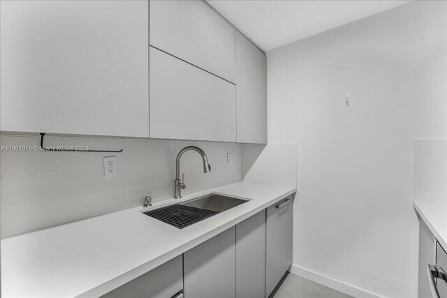 1865 79th St Unit 12G, North Bay Village, FL 33141 - kitchen with light countertops, modern cabinets, and gray cabinetry