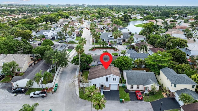 14100 Langley Pl, Davie, FL 33325 - aerial perspective of suburban area featuring a large body of water