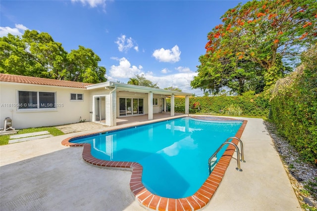 1237 Dove Ave, Miami Springs, FL 33166 - view of swimming pool featuring a patio area