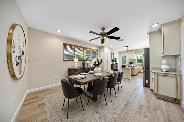 1237 Dove Ave, Miami Springs, FL 33166 - view of front of home featuring a front lawn, asphalt driveway, and stucco siding