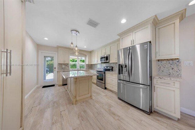 1237 Dove Ave, Miami Springs, FL 33166 - mediterranean / spanish house featuring a tile roof, a front lawn, and stucco siding