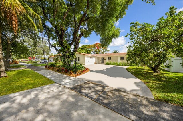 1237 Dove Ave, Miami Springs, FL 33166 - unfurnished living room with a ceiling fan, light wood-type flooring, and recessed lighting