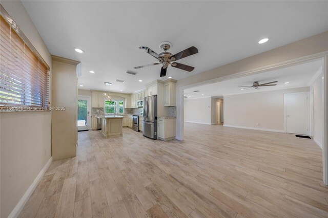 1237 Dove Ave, Miami Springs, FL 33166 - spare room with crown molding, recessed lighting, ceiling fan, and light wood-type flooring