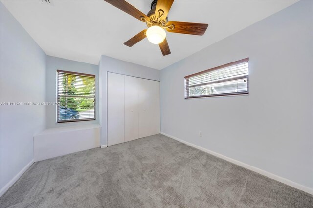 1237 Dove Ave, Miami Springs, FL 33166 - unfurnished bedroom with carpet floors and a closet