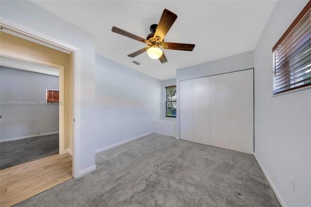 1237 Dove Ave, Miami Springs, FL 33166 - unfurnished bedroom featuring carpet flooring and a closet
