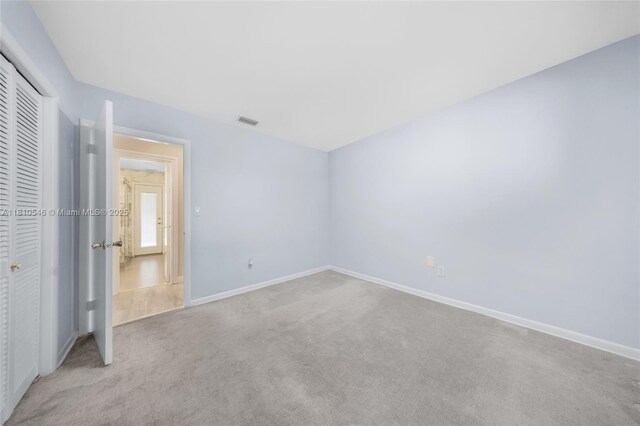 1237 Dove Ave, Miami Springs, FL 33166 - unfurnished bedroom with carpet floors, a closet, and ceiling fan