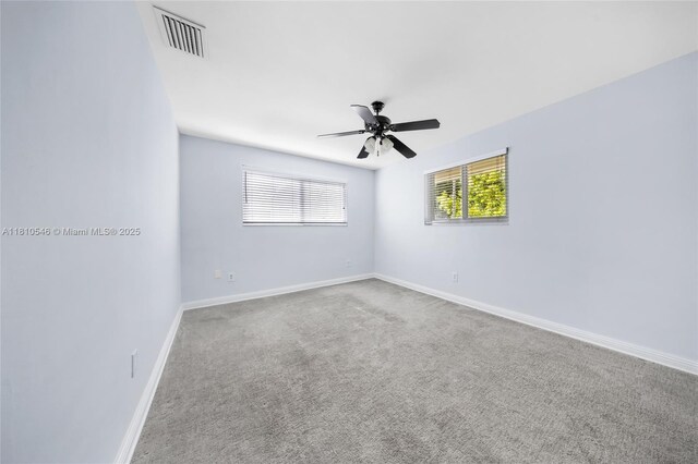 1237 Dove Ave, Miami Springs, FL 33166 - unfurnished bedroom with carpet flooring, a closet, and ceiling fan