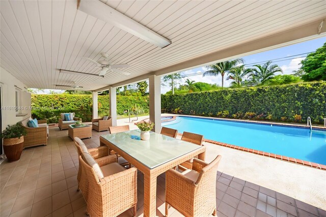 1237 Dove Ave, Miami Springs, FL 33166 - view of swimming pool with ceiling fan, a fenced backyard, and a patio