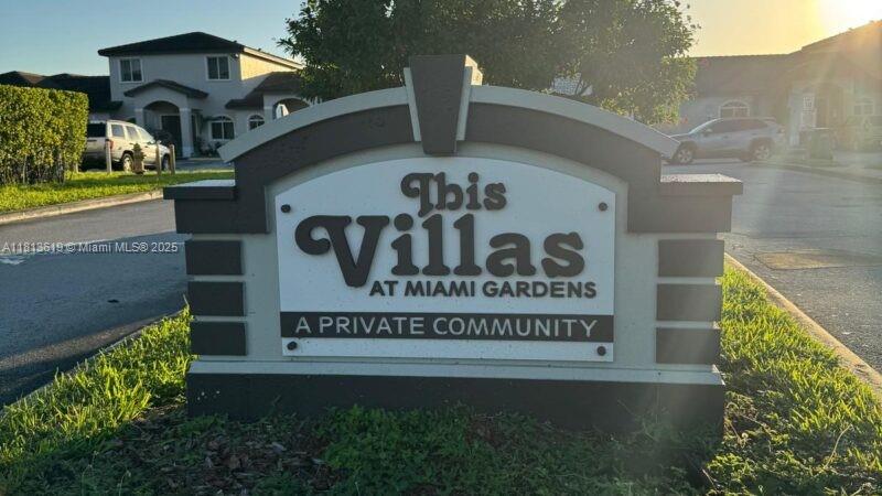 18712 NW 84th Pl Unit 303-3, Hialeah, FL 33015 - view of community sign