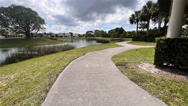 4330 Hillcrest Dr Unit 505, Hollywood, FL 33021 - view of community with a water view and a yard