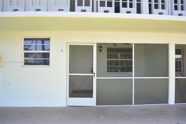 705 NE 2nd St Unit 4, Hallandale Beach, FL 33009 - property entrance with stucco siding