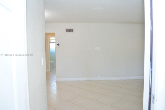 705 NE 2nd St Unit 4, Hallandale Beach, FL 33009 - spare room with light tile patterned floors and baseboards