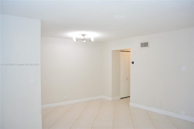 705 NE 2nd St Unit 4, Hallandale Beach, FL 33009 - unfurnished room featuring baseboards and light tile patterned floors