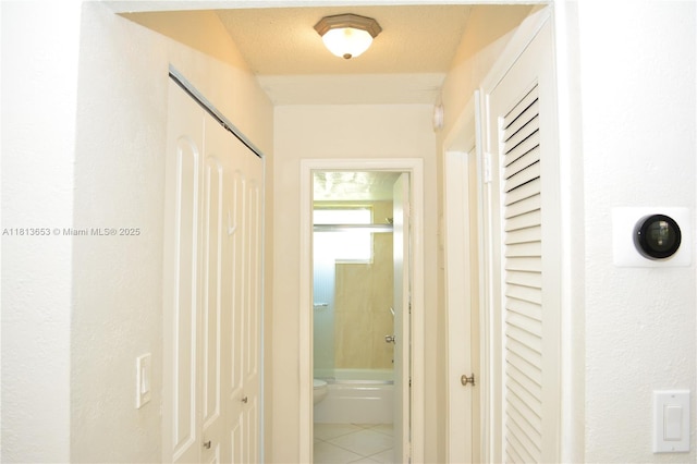 705 NE 2nd St Unit 4, Hallandale Beach, FL 33009 - hallway featuring tile patterned flooring