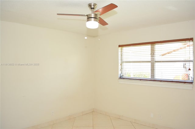 705 NE 2nd St Unit 4, Hallandale Beach, FL 33009 - spare room featuring a ceiling fan, baseboards, and light tile patterned flooring