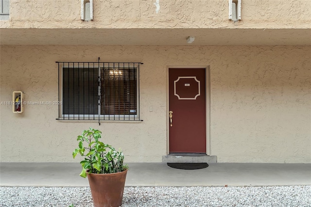 8401 SW 107th Ave Unit 117E, Miami, FL 33173 - view of exterior entry with stucco siding