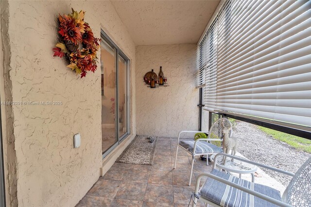 8401 SW 107th Ave Unit 117E, Miami, FL 33173 - sunroom / solarium featuring healthy amount of natural light