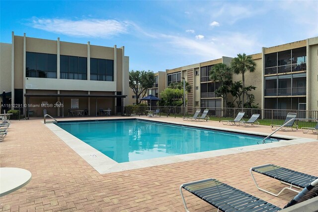 8401 SW 107th Ave Unit 117E, Miami, FL 33173 - community pool with a patio area