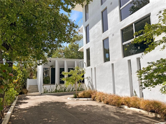 10250 Collins Ave Unit 211, Bal Harbour, FL 33154 - view of side of home with stucco siding
