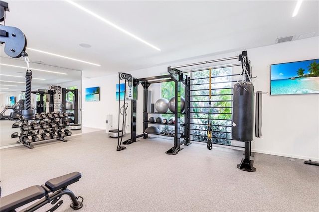 10250 Collins Ave Unit 211, Bal Harbour, FL 33154 - gym with baseboards